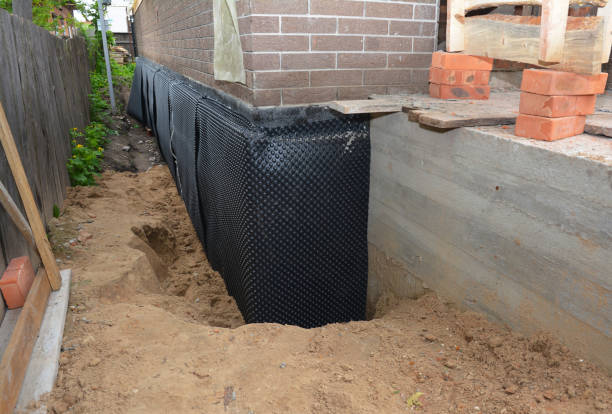 SJ Waterproofing Pros technician performing targeted Sump Pump Installation assessment in Springfield, KY
